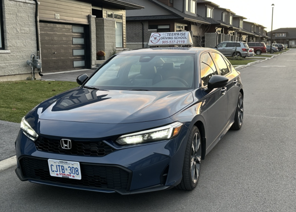 Hamilton Driving School – SteerWise SteerWise Driving School instructor teaching a student in Hamilton